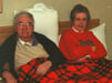 Grandma and grandpa watching the game